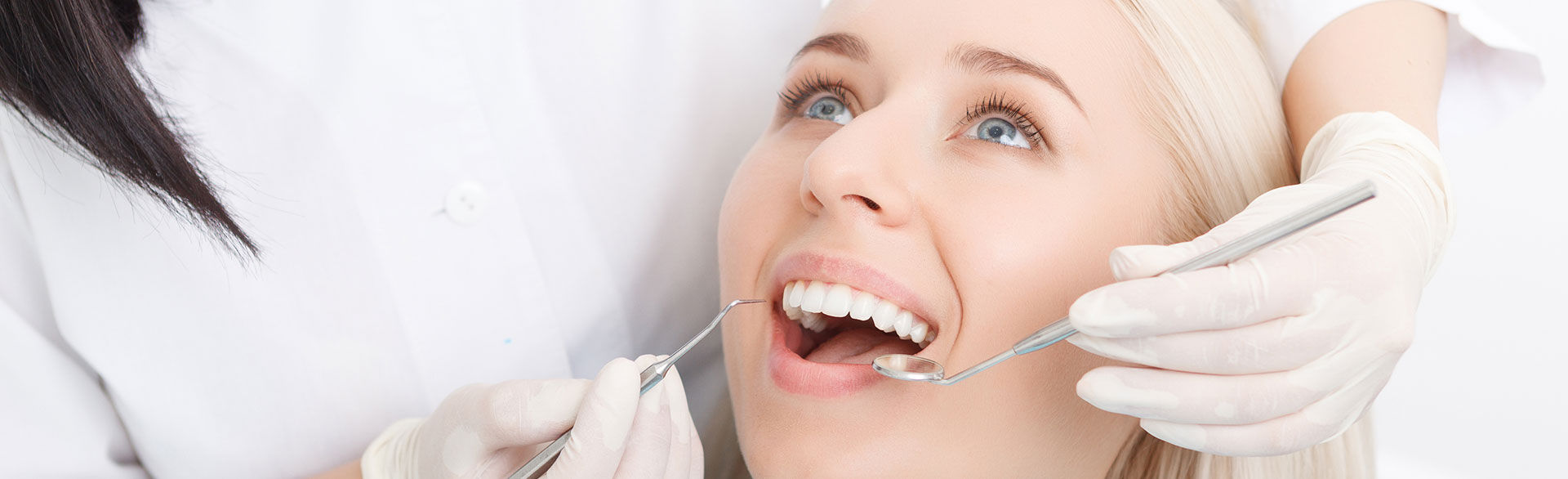 woman receiving a dental cleaning